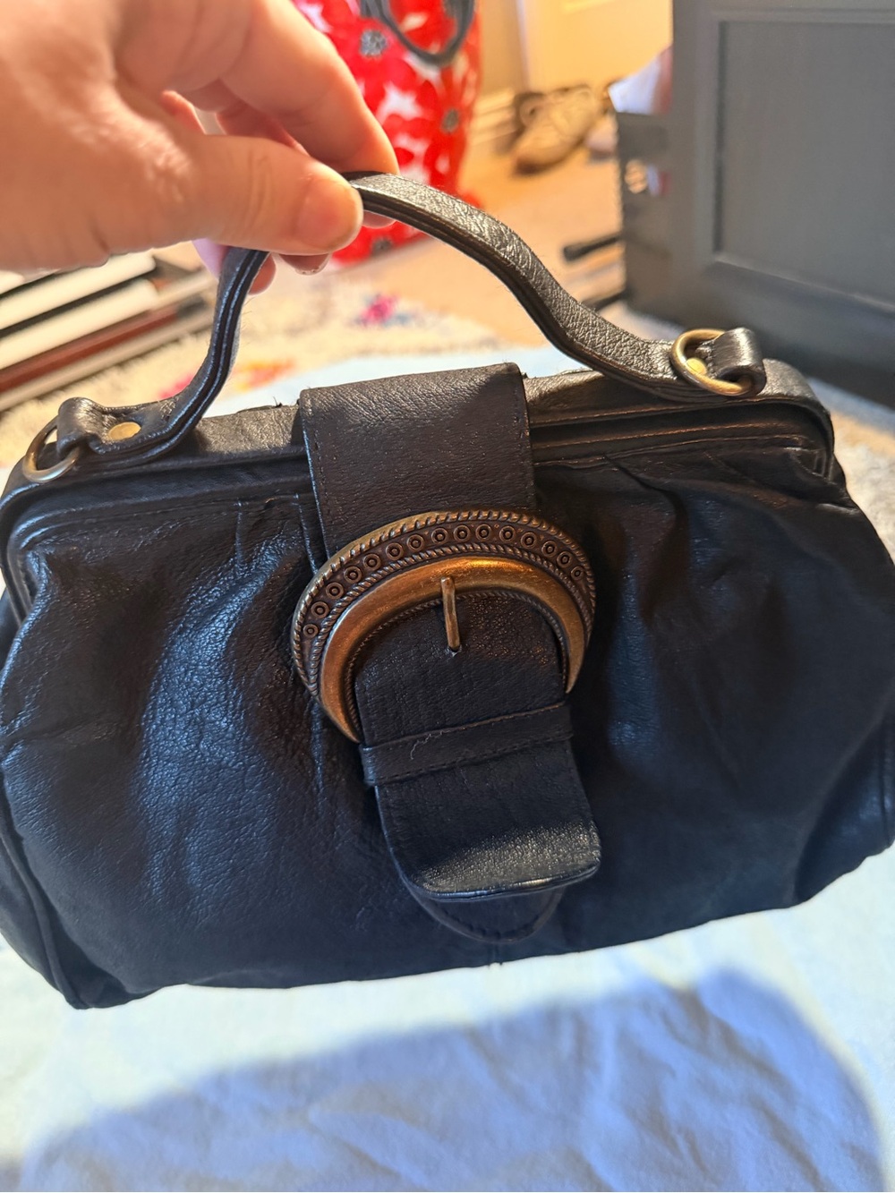 Classic Black Leather Wristlet Clutch with Antique Gold Buckle Accent